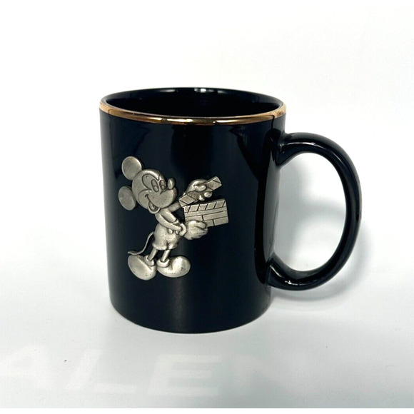 The Walt Disney Studios Black Coffee Mug Gold Trim Pewter Mickey Mouse 3D Emblem - Picture 1 of 2